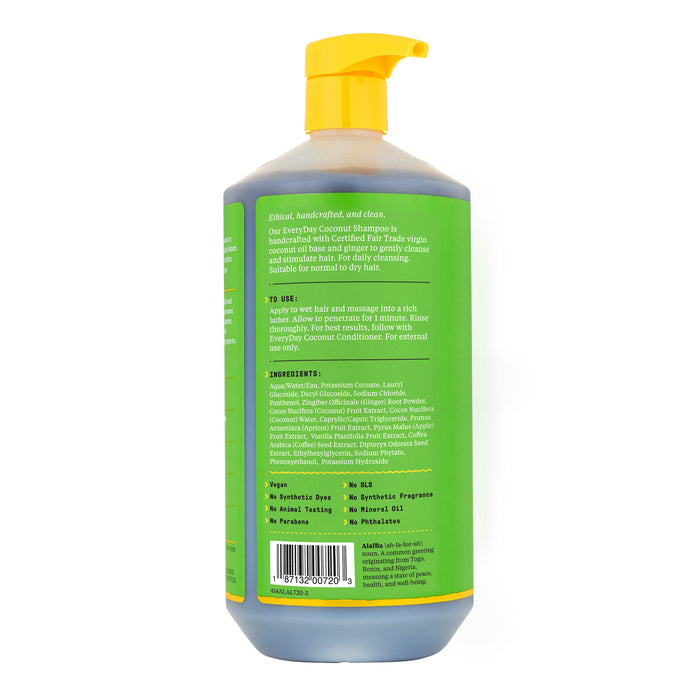 A bottle of Alaffias Everyday Coconut Shampoo, featuring a yellow pump and green label with directions and ingredients, highlights ethically sourced ingredients, is handcrafted and clean, and free from synthetic fragrances and parabens.