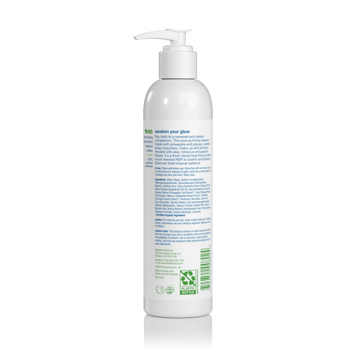 A white pump bottle of Alba Botanica Exfoliating Facial Cleanser, back label shown with blue and green text about its pineapple and papaya formula; vegan, cruelty-free, recyclable—ideal for a radiant complexion.