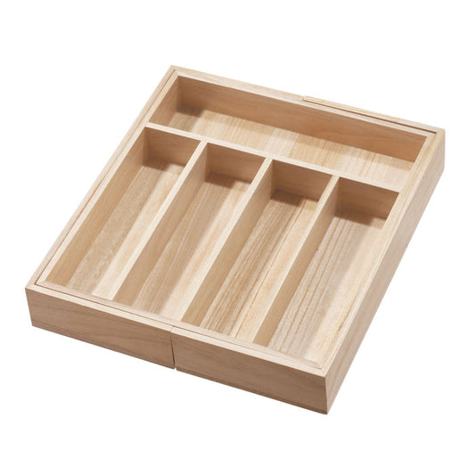 The iDesign Expandable Wood Cutlery Tray offers four long compartments and a top section for kitchen organization. Made from renewable Paulownia wood, it adds elegance with its light color against a white background while efficiently organizing your utensils.