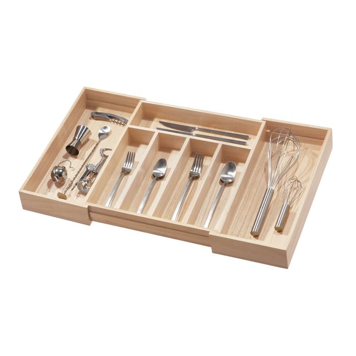 The iDesign Expandable Wood Cutlery Tray is made from renewable wood and has separate compartments to organize silver utensils like forks, knives, spoons, whisks, a corkscrew, and measuring spoons in your kitchen drawer.