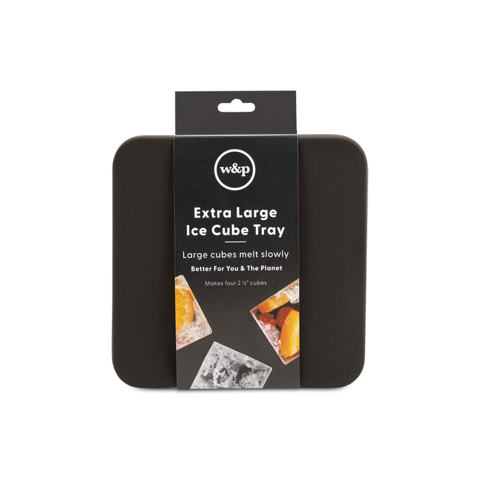 The W&P Extra Large Ice Cube Tray is a black square tray that creates four 2-inch slow-melting ice cubes, ideal for large fruit-infused drinks. The packaging highlights its eco-friendly benefits: Large cubes melt slowly, better for you & the planet.
