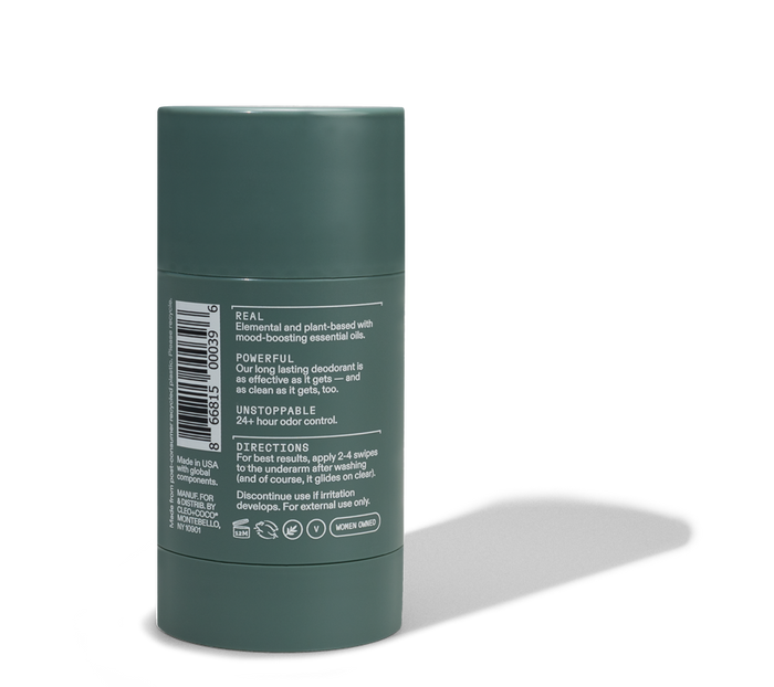 A green cylindrical Cleo & Coco Extra Strength Deodorant stands upright, label featuring white text with product info, directions, activated charcoal ingredients, barcode, and icons.