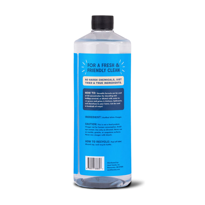 Aunt Fannies Extra Strength Vinegar: For Cleaning comes in a large clear bottle with a black cap and blue label. It highlights its natural formula ideal for descaling and buildup removal, with instructions, ingredients, and recycling information for eco-friendly use.