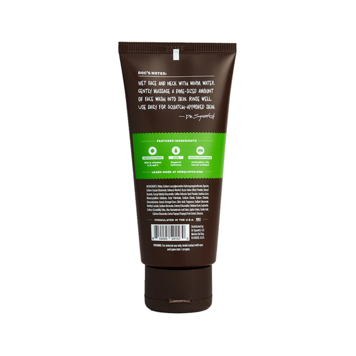 A brown tube of Dr. Squatch Face Wash features a green label with aloe vera and sensitive skin instructions. The cap complements the tube, emphasizing daily use. Ingredients like green coffee bean are highlighted for enhanced benefits.