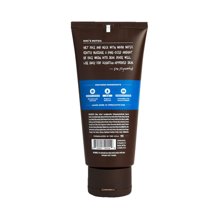 A brown tube of Dr. Squatch Face Wash stands upright, displaying the back label with instructions and skincare tips. The blue section emphasizes Aloe Vera and Green Coffee Bean as key ingredients, plus a QR code at the bottom.