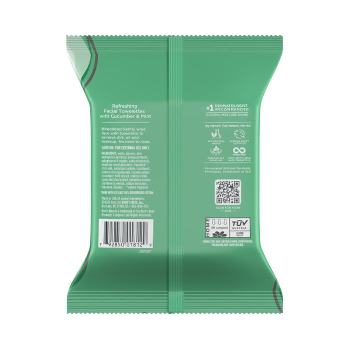 The reverse of Burts Bees Facial Cleansing Towelettes - Refreshing features cucumber and mint towelettes as natural skin care essentials. It includes directions, caution, barcode, QR code, dermatologist recommendation, and various certification logos on the green packaging.