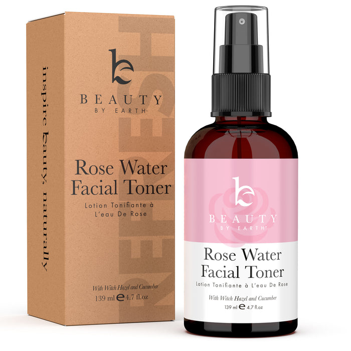 Beauty by Earths Facial Toner with Witch Hazel & Rose Petal Water is stylishly presented in eco-friendly packaging. The dark bottle, equipped with a spray nozzle and pink label, highlights its hydrating rose petal water blend. Both display Facial Toner alongside other details.