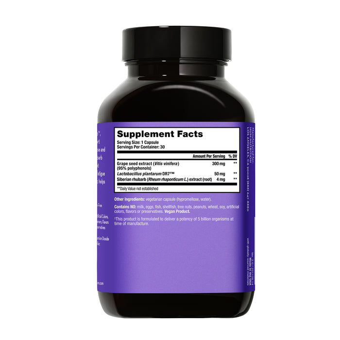 A black bottle with a purple label shows supplement details for HUM Nutritions Fan Club Menopause Relief, featuring ingredients like grape seed extract, lactobacillus, and Siberian rhubarb. This probiotic formula aims to ease menopause symptoms and is displayed from the back against a white background.
