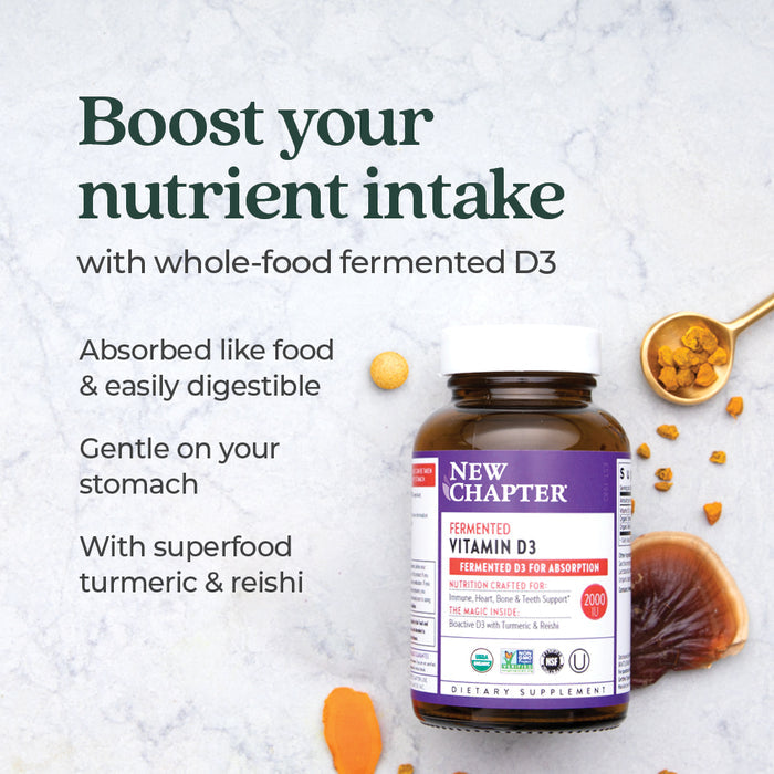 A bottle of New Chapter Fermented Vitamin D3, 2,000 IU for Immune, Heart & Bone Support sits on a light surface with turmeric and reishi. Text highlights whole-food D3 for bone, immune & heart support plus gentle digestion and superfoods.