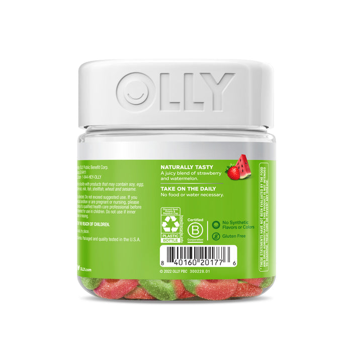 The OLLY Fiber Gummy Rings come in a clear plastic jar with a white lid. They have red and green gummies. The green label focuses on natural flavors and daily digestive health tips, emphasizing prebiotic fiber for better water efficiency. A barcode is also present.