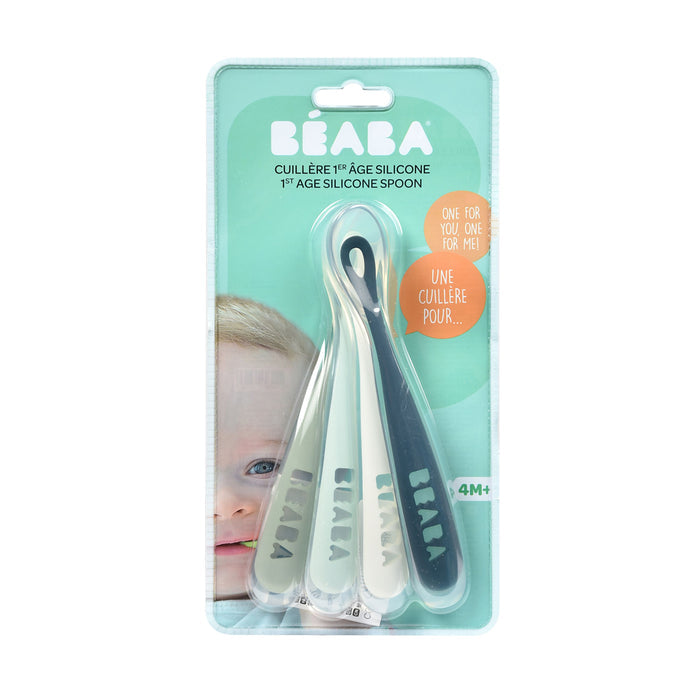 The BEABA First Foods Silicone Spoons, sold in a set of three, are ideal for babies aged 4 months and older. They come in green, beige, and blue and are packaged attractively with a clear display featuring a cute baby image.