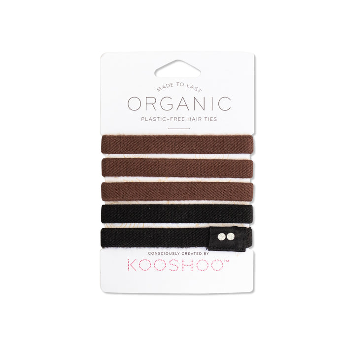 KOOSHOOs Organic Hair Ties come in a set of five on a white backing card, featuring brown and black shades. Made to Last and Consciously Created, they embody sustainable fashion with these natural elastics.