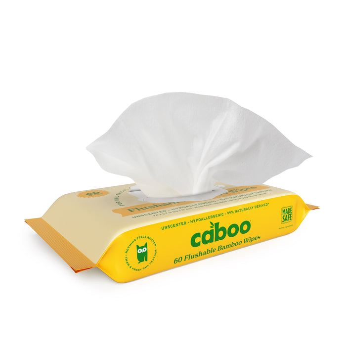 A yellow Caboo Flushable Wipes pack with one wipe out shows an owl logo. These unscented, hypoallergenic wipes are made safe from 100% naturally derived materials and contain 60 wipes, offering a sustainable choice.