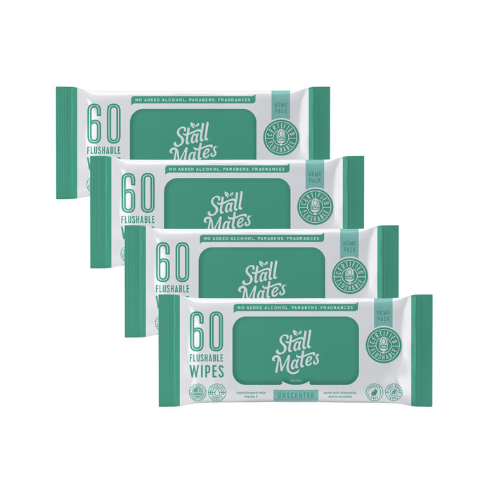 Four packs of Stall Mates Flushable Wipes Set, each with 60 hypoallergenic, unscented wipes, are arranged in a row. The green and white packaging notes theyre septic-safe and free from alcohol, parabens, and fragrances.