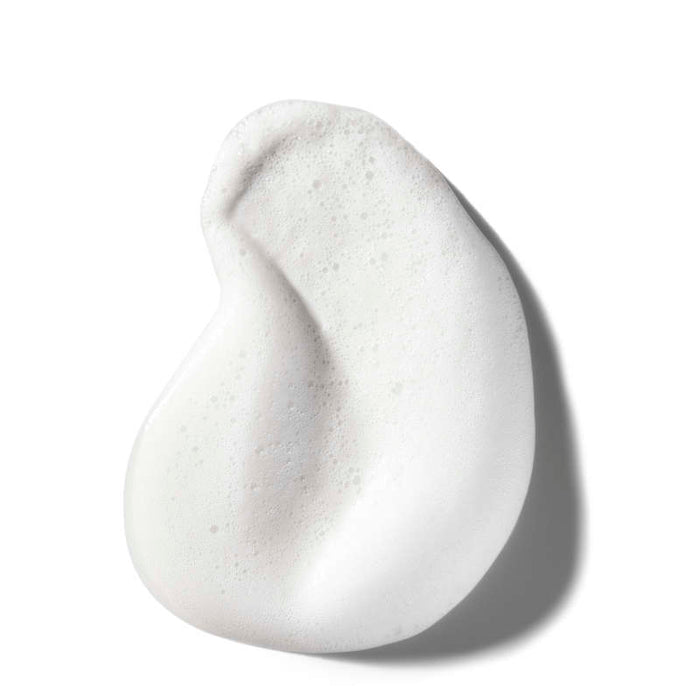 A close-up shows a dollop of creamy, white foam with soft shadows, evoking the texture of methods Foaming Body Wash, a luxurious product with a cruelty-free formula against a white background.