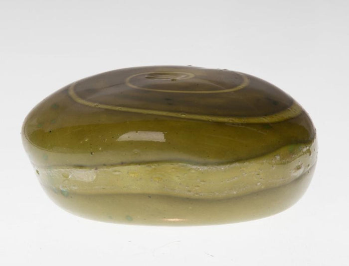 Olive green round forest votive memorial stone with a hollow cavity for the LED tealight