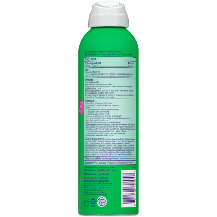 Back view of a green Alba Botanica aerosol can with a white cap for sensitive skin. The label lists drug facts, active ingredients, warnings, directions, and other info in blue text. A round white and pink logo is on the left side. Product: Fragrance Free Sheer Mineral Sunscreen Spray - SPF 30.