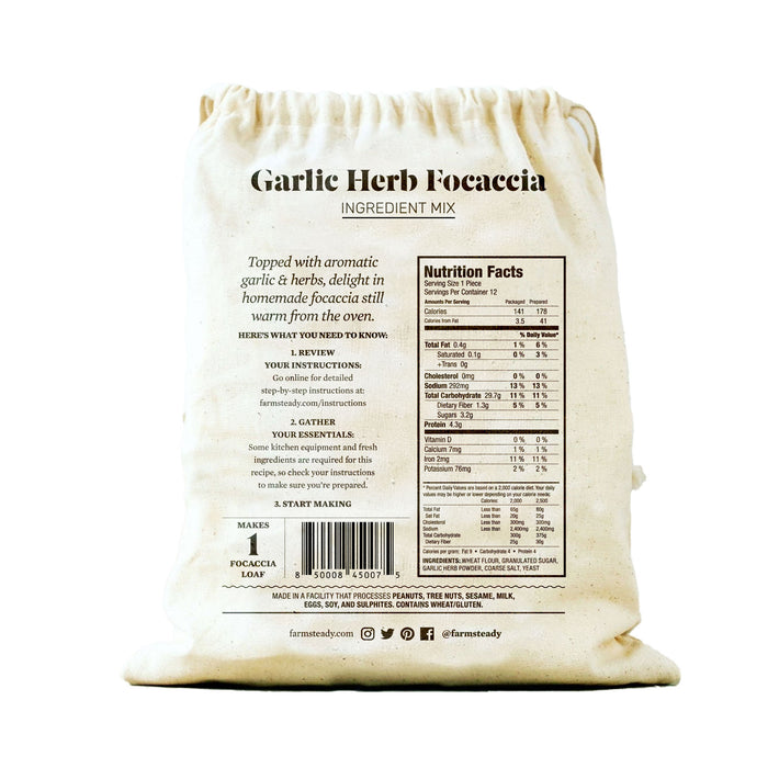 The beige Garlic Herb Focaccia Baking Mix bag from FarmSteady offers a complete baking kit with detailed ingredients, nutrition facts, and preparation instructions on the back, along with the FarmSteady logo and social media icons.