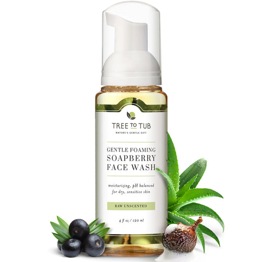 Tree To Tubs Gentle Face Wash for Sensitive Skin features a pump dispenser. Ideal for sensitive skin, it is raw, unscented, and fragrance-free. Surrounding the bottle are soapberries, an aloe vera leaf, and fresh leaves.
