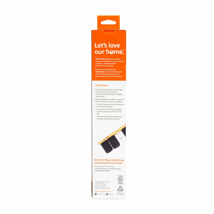 The tall rectangular package of the Get A Grip - Mop & Broom Organizer by Full Circle features eco-themed text, Lets love our home. It promotes reduced plastic waste, includes care instructions, and highlights environmental innovations and clever storage solutions.