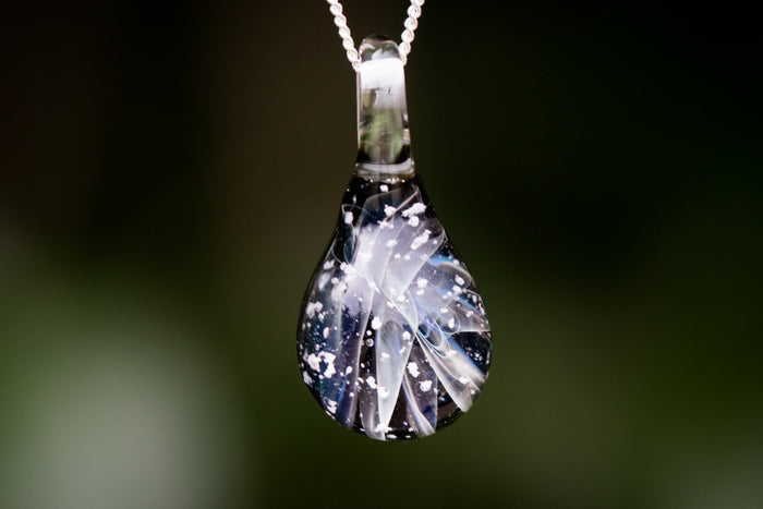 ghost drop cremation jewelry with ash