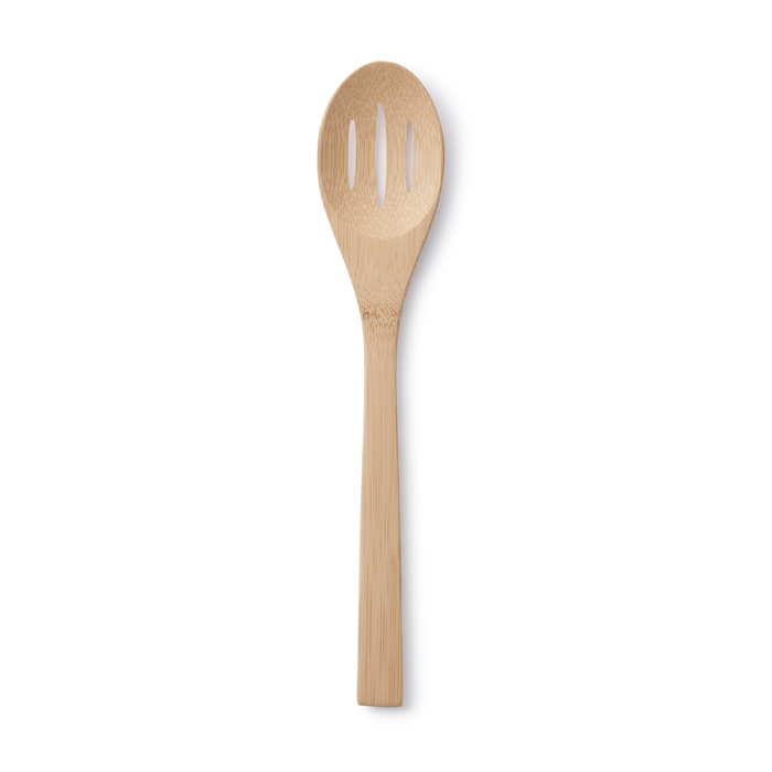 Explore the elegance of Bambus Give it a Rest Slotted Spoon, made from USDA organic bamboo. Featuring a light wood finish, a long handle, and three slots for optimal straining or stirring in any kitchen. Background is plain white.