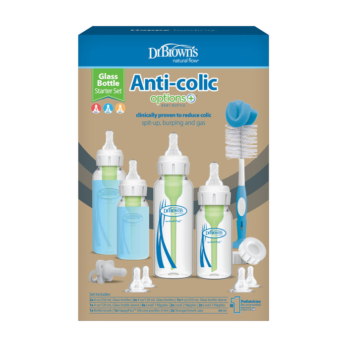 Dr. Browns box packaging showcases the Glass Baby Bottle Starter Set with Narrow Natural Flow® Anti-Colic Options+™ Bottles, featuring four baby bottles with silicone nipples, vents, two cleaning brushes, and accessories. It highlights colic symptom reduction benefits.