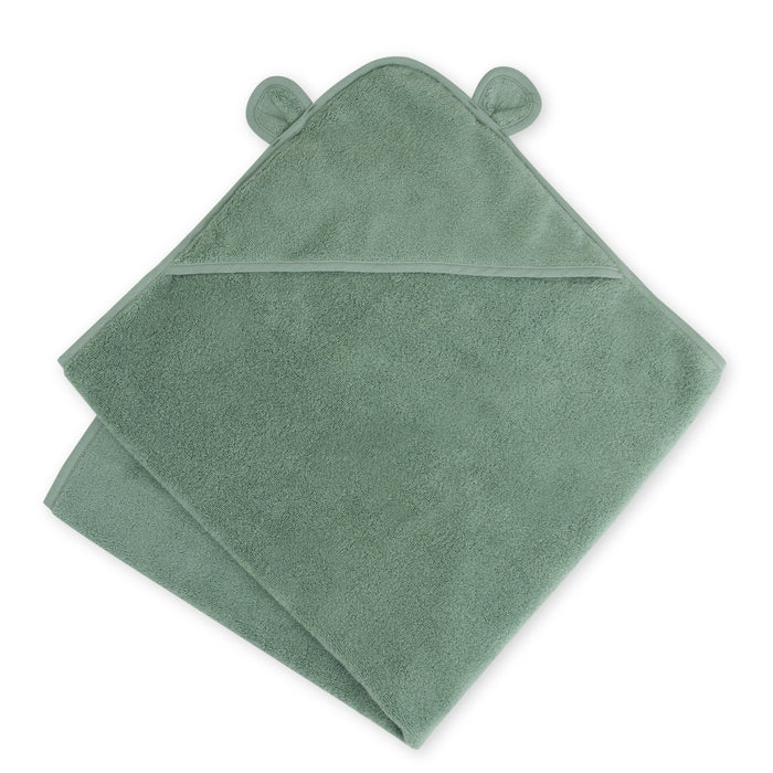 A neatly folded, green Natemia baby bath towel features a cute hood with small ears. Crafted from GOTS certified 100% organic cotton, its ultra-soft and absorbent.