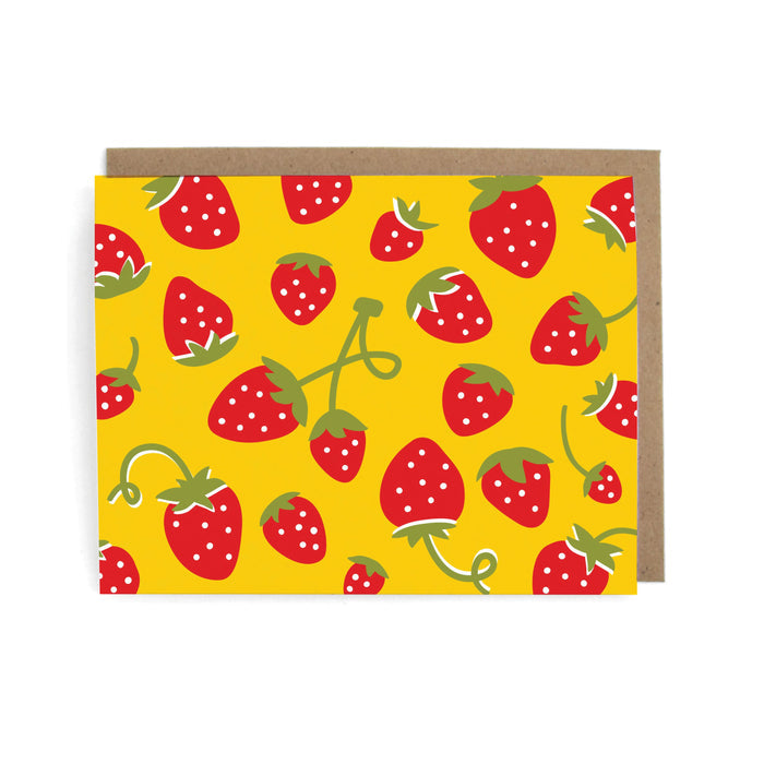 The Neighborgoods Greeting Cards feature a vibrant yellow design adorned with red strawberries and green leaves. Complemented by original artwork and paired with a brown envelope, this thank you card set is perfect for any occasion.