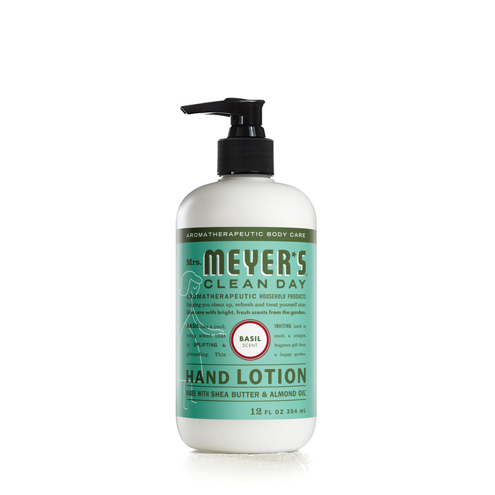 Mrs. Meyers Hand Lotion (12 fl oz) features an invigorating basil scent and is packaged in a white bottle with a black pump and green labeling. Enriched with shea butter and almond oil, it offers aromatherapeutic benefits for a refreshing experience.