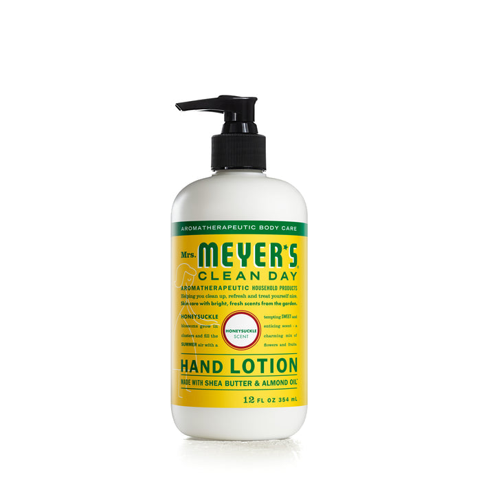 Mrs. Meyers Hand Lotion boasts a yellow label with green accents, offering a lovely honeysuckle scent. This 12 fl oz bottle contains nourishing shea butter and almond oil, and is equipped with a black pump dispenser for convenience.