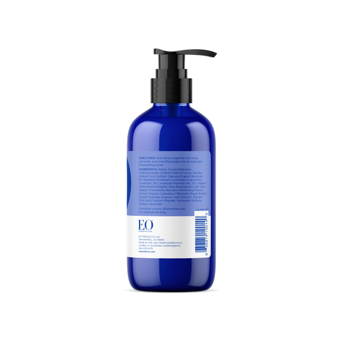 The EO Products Hand Soap is in a blue bottle with a black pump, featuring calming French lavender. The label has soothing white and blue text detailing ingredients for a balanced microbiome, usage directions, and product information.