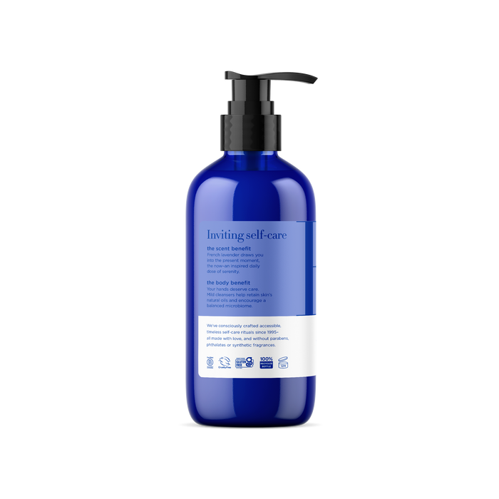 The blue pump bottle of EO Products Hand Soap features a label highlighting Inviting self-care with benefits and ingredients. Infused with calming French lavender, it ensures a balanced microbiome. Eco-friendly and skincare symbols are displayed at the bottom.
