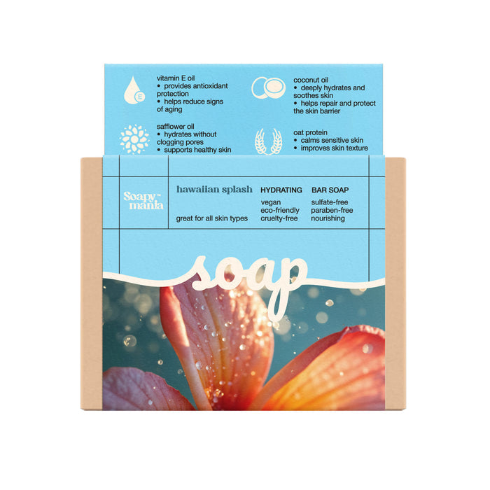 Soapymania’s Hawaiian Splash Hydrating Bar Soap features a floral design with plumeria accents. This handcrafted, vegan, eco-friendly bar is sulfate- and paraben-free, cruelty-free, and lists key ingredients and benefits on the package.