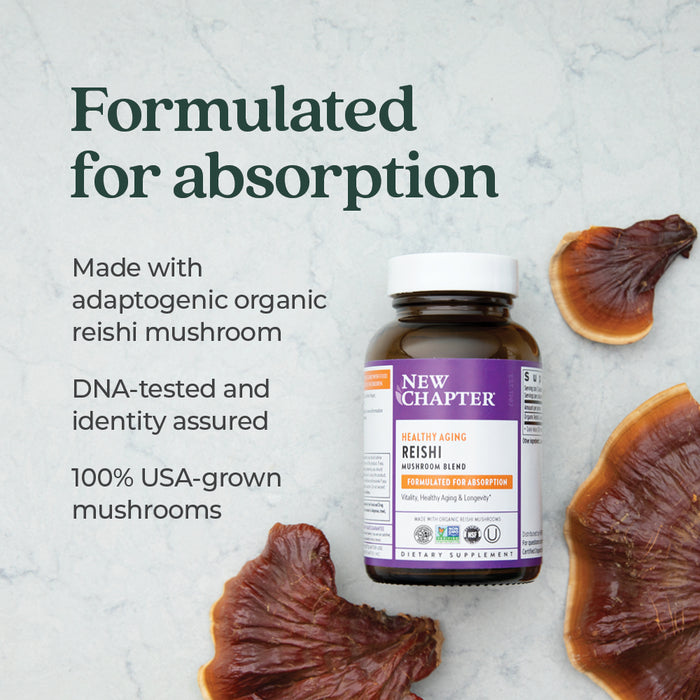 A bottle of New Chapter Healthy Aging Reishi Mushroom Blend dietary supplement is placed on a marble surface. Nearby are three pieces of reishi mushrooms. Text reads: "Formulated for absorption" and includes product details.