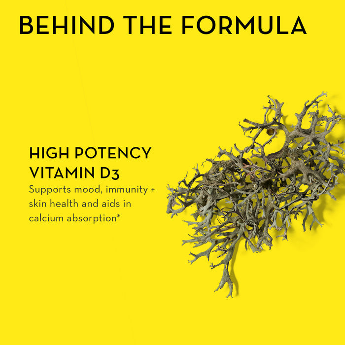 A yellow background with the text "BEHIND THE FORMULA" at the top. Below, in the left section, it reads "HIGH POTENCY VITAMIN D3" and "Supports mood, immunity + skin health and aids in calcium absorption*". An image of a dried plant or seaweed.
