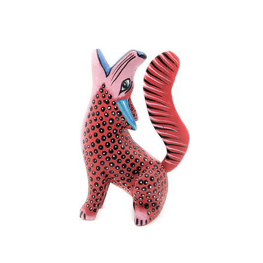 Howling Red and Black Spotted Coyote