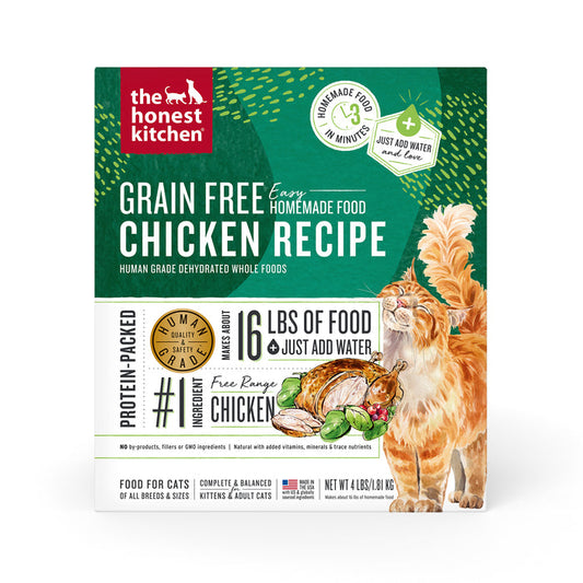 A box of The Honest Kitchens Dehydrated Grain Free Chicken Cat Food features images of a chicken, fresh vegetables, and a ginger cat, highlighting its whole food ingredients. Just add water to make 16 lbs of nutritious human-grade pet food.