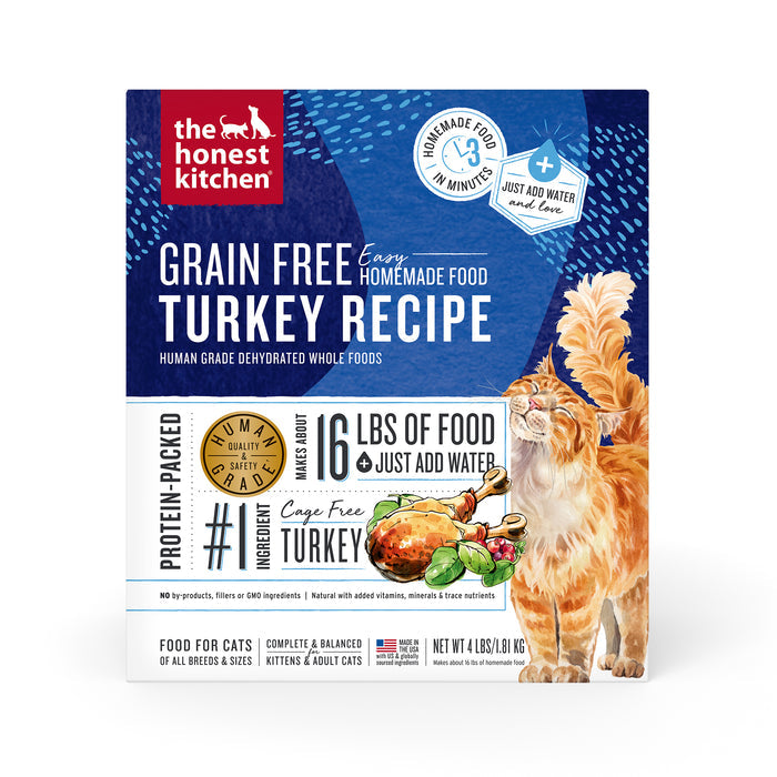 The Honest Kitchens Dehydrated Grain Free Turkey Cat Food packaging showcases an orange cat illustration and a bowl of prepared meal yielding 16 lbs. Highlights include human grade, protein-packed, and made with whole foods..