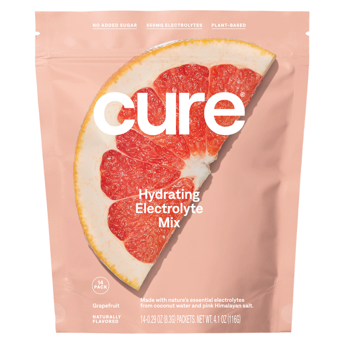 Cure Hydrations Hydrating Electrolyte Drink Mix comes in a pouch with a grapefruit image and contains 14 packs (4.1 oz/116g). It features rapid absorption, no added sugar, 550mg electrolytes, is plant-based, naturally flavored, and provides relief from dehydration.