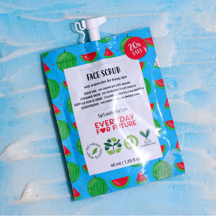 The Hydrating Watermelon Face Scrub by Everyday For Future is shown on a textured, light blue background. With a pump cap and watermelon illustrations, the pouch offers 20 uses for dry skin. It boasts natural ingredients for a vegan and cruelty-free skincare experience.