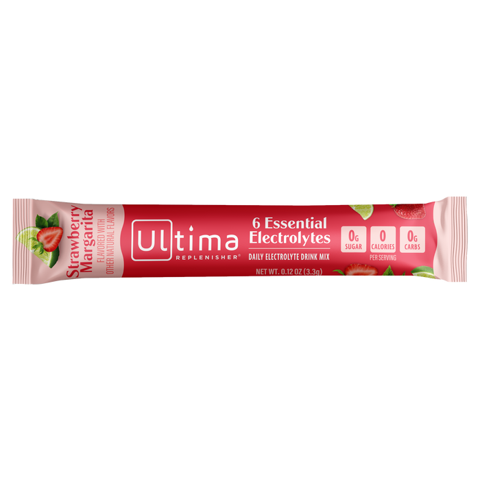 A single pink packet of Ultima Replenishers Hydration Electrolyte Pouch for the Mocktini Drink Mix Variety Pack flaunts a sugar-free Strawberry Margarita flavor with 6 Essential Electrolytes, 0g Sugar, 0 Calories, and 0g Carbs, featuring strawberries and lime slices.