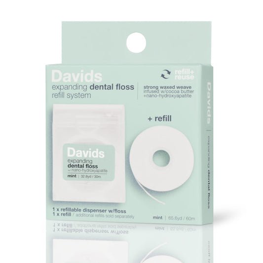 Explore Davids Expanding Dental Floss and Refill with Hydroxyapatite, featuring a refillable dispenser. Infused with mint, cocoa butter, nano-hydroxyapatite, and vegan wax for an eco-friendly and refreshing oral care experience.