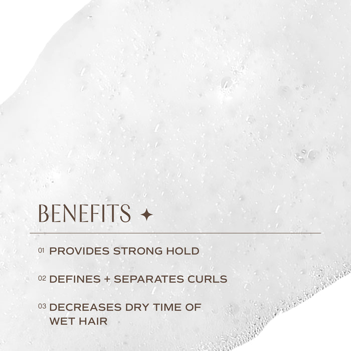 A textured white background with text stating the benefits of a product: 1) Provides strong hold, 2) Defines + separates curls, 3) Decreases dry time of wet hair.