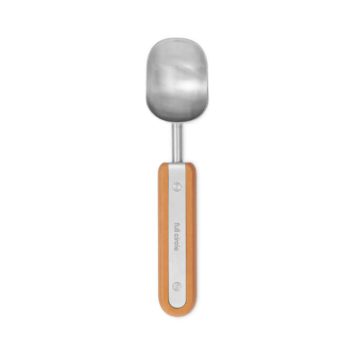 The Full Circle Ice Cream Scoop features a stainless steel, slightly rectangular scoop with rounded edges and a wooden handle. The flat handle has visible screws and the brand name Full Circle engraved on it. Its dishwasher safe for easy cleaning.