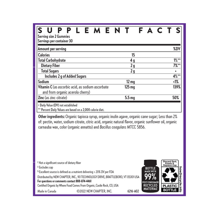The New Chapter Immune Defense Vitamin C+ Gummy features a supplement facts label with daily values for calories, carbs, sugars, sodium, and zinc. Made in Canada, it includes tapioca syrup, apple pectin, Acerola Cherry extracts and displays recycling and certification icons.