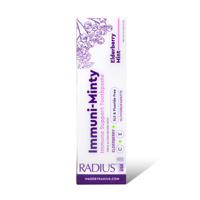 A white box of Radius Immuni-Minty Adult Toothpaste in Elderberry Mint, with purple text, elderberry graphics, and highlights like hydroxyapatite (fluoride-free) plus vitamins C, D & E.