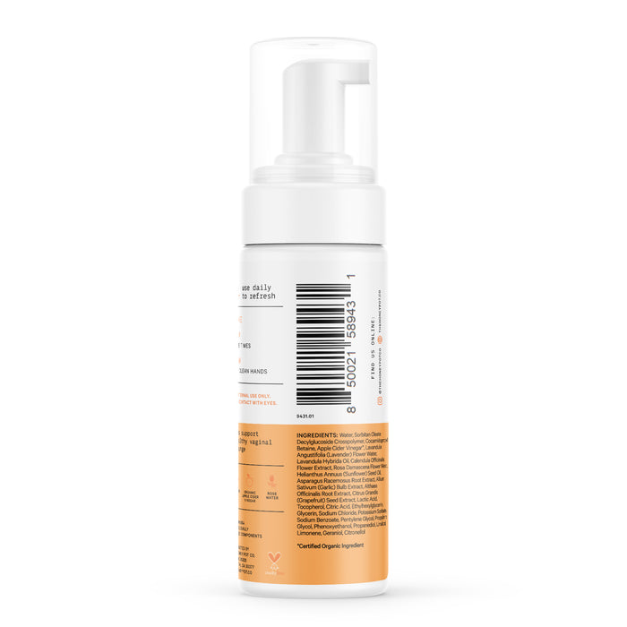 The Honeypot Companys Foaming Wash - Normal comes in a white pump bottle with product info, barcode, orange accents, lactic acid ingredients, usage instructions, and a recycling symbol. Its designed for pH balance care as an intimate wash.