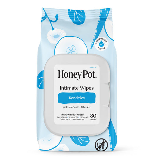 A package of The Honeypot Company Intimate Wipes - Sensitive, featuring a blue and white floral design. The label notes pH balanced for healthy vaginal pH, 30 count, and no parabens, sulfates, or synthetic fragrances.