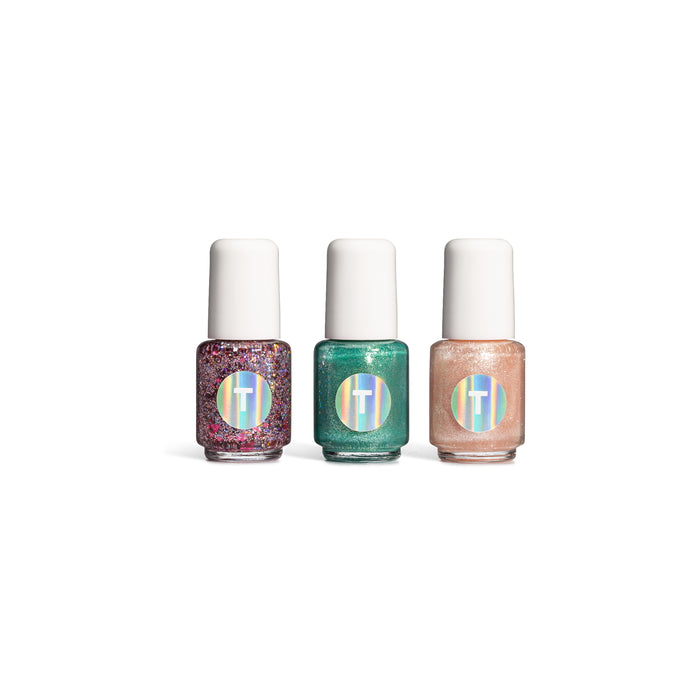 Terra Beauty Bars Kids 3-Piece Glitter Shimmer Nail Collection, with vegan and 10-free polish, features bottles with colorful circular logos in glittery pink, teal, and peach against a white background.